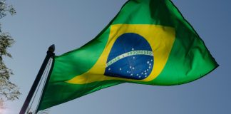 Impacto da tecnologia no setor de apostas: insights da Optimove para o mercado brasileiro Bandeira do Brasil para falar do mercado brasileiro de apostas com Optimove