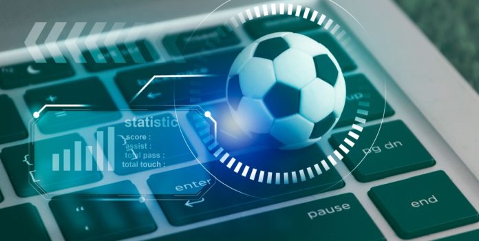 imagem de bola de futebol para falar do relatório da LSports que fala sobre tendências de apostas esportivas