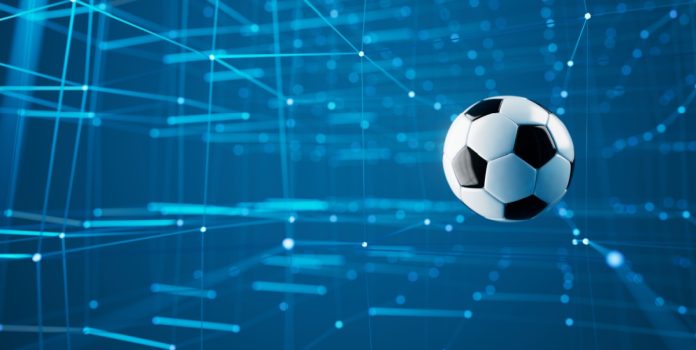 Bola de futebol com fundo azul
