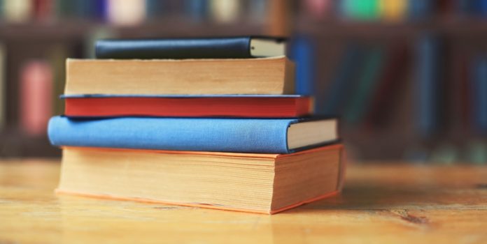 Livros representam a Enciclopédia de Apostas Esportivas da Blaze