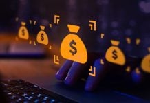Símbolo do dólar dentro de um saco virtual na frente da tela do computador