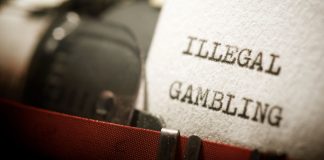 Papel escrito 'Ilegal Gambling'