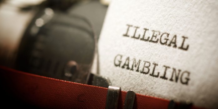 deputado-pt-proposta-plp-182-2025-tributos-apostas-ilegais Papel escrito 'Ilegal Gambling'