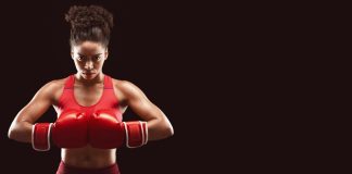 Betsul patrocina Fight Music Show 7 Mulher com luvas de boxe pronta para lutar