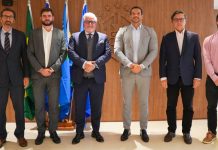 SIGA e CBF fortalecem aliança pela integridade no futebol Representantes da SIGA e da CBF posando para foto