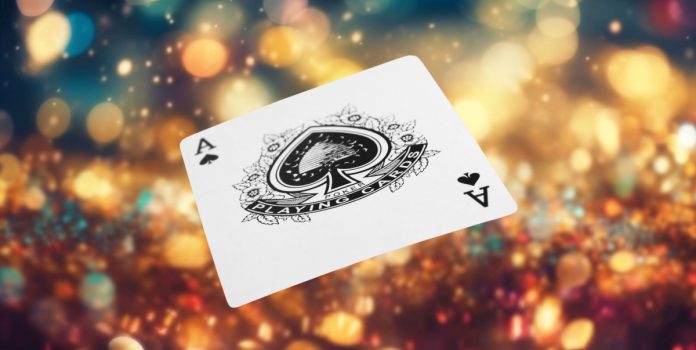 aposta-ganha-firma-parceria-com-yggdrasil Carta de baralho flutuando com fundo colorido e brilhoso