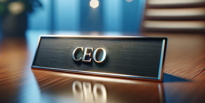 CEO-Placa Placa de identificação escrito CEO, colocada em cima da mesa.