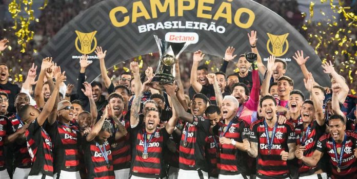 Flamengo-Campeão-Brasileirão-2025 Jogadores do time de futebol do Flamengo comemoram o título do Brasileirão Série A 2025.