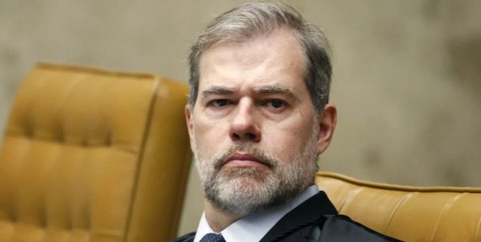 Ministro-STF-Dias-Toffoli Foto do ministro do STF, Dias Toffoli, um homem branco, de meia idade, vestido de terno.