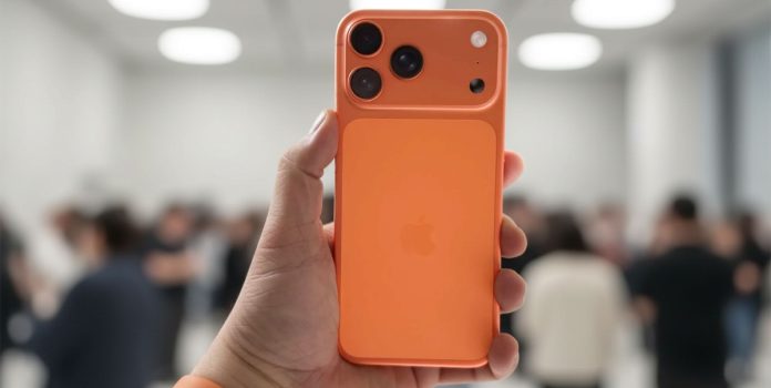 betsul-lança-aplicativo-com-vibra-solutions Uma mão segurando o iPhone 17 Pro laranja