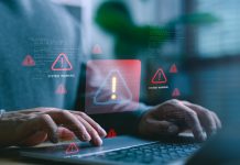 Computador emitindo sinal de alerta.