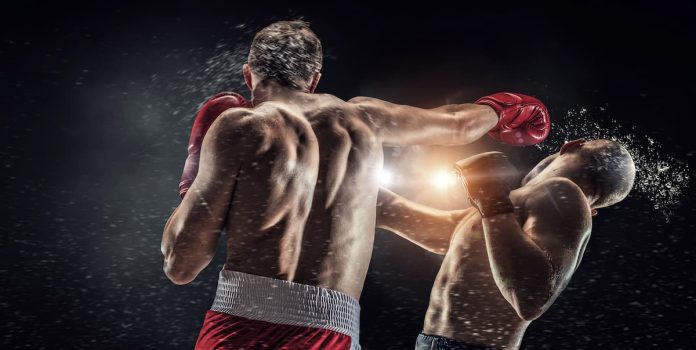 Boxe Dois lutadores de boxe lutando.