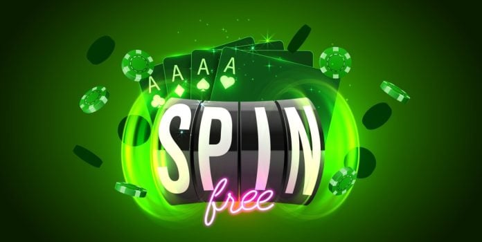 1spin4win-e-Blask-analisam-principais-mercados-de-apostas-na-America-Latina-e-Africa Representação de um caça-níquel virtual com a escrita de rodada grátis, cartas de baralho e fichas de cassino