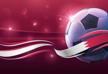 SOFTSWISS e SBC promovem webinário sobre Copa do Mundo 2026 com foco na LatAm Bola de futebol com fundo vermelho.