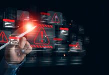 Fórum de Provedores de Pagamento da IBIA publica guia para combater apostas ilegais no Brasil Sinal de alerta em computador.