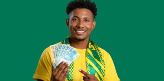 Aposta Legal aponta contribuição de R$ 1.400 por jogador às receitas das operadoras em 2025 Homem segurando cédulas de Real com as cores do Brasil em destaque