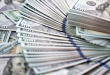 Mercado preditivo deve atingir US$ 240 bilhões em 2026, segundo Bitget Wallet e Polymarket Uma pilha de dólares.