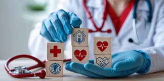 Deputado apresenta PL para destinar recursos de apostas a Santas Casas e hospitais filantrópicos Um médico segurando cubos de madeira com ícones que representam saúde e caridade.