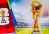 Bolsa de Aposta alerta para riscos a apostadores iniciantes durante a Copa do Mundo Troféu da Copa do Mundo FIFA em fundo desfocado