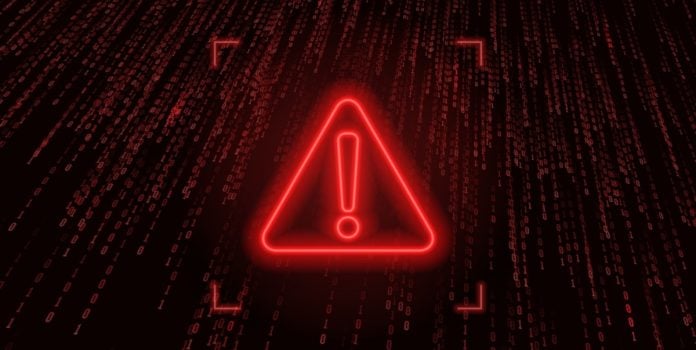 Daniel-Fortune-Alerta-Pais-Sobre-Envolver-Indiretamente-Menores-Em-Apostas Símbolo de alerta em vermelho.