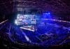 Oddin.gg firma parceria com BETesporte para ampliar apostas em esports no Brasil Arena de esports lotada de fãs.