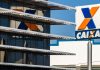 Caixa reduz limites de transações após ataque cibernético atingir lotéricas Fachada de uma agência da Caixa Econômica Federal.