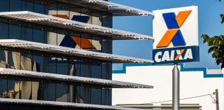 Caixa reduz limites de transações após ataque cibernético atingir lotéricas Fachada de uma agência da Caixa Econômica Federal.