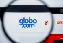 Globo pode proibir patrocínios de empresas de apostas no BBB 27 Uma lupa focando no site da Globo