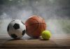 Olho na BET expande cobertura para tênis e basquete Bolas de baquete, tênis e futebol em um fundo com fumaça, feita com IA