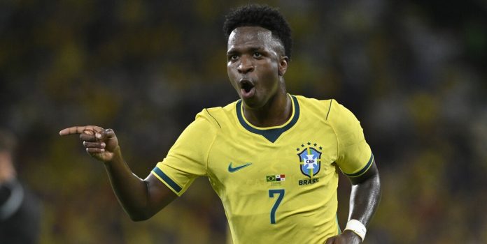 unico-registra-recorde-de-autenticações-de-transações-de-apostas-na-copa-do-mundo-2026 Vini Jr. vestindo a camisa 7 da Seleção Brasileira