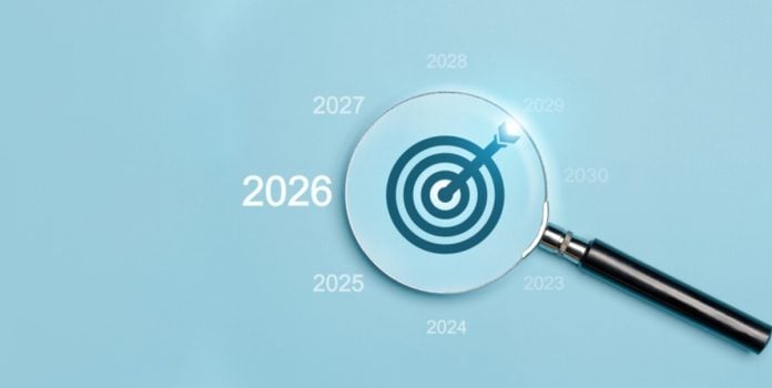 apostas-online-atingem-ggr-de-20-bi-primeiro-semestre-2026 Lupa destacando o ano de 2026 como alvo em fundo azul