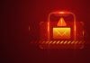 Golpe do Auxílio Reconstrução direciona vítimas a sites de apostas ilegais Uma ilustração de um smartphone em fundo vermelho e com o símbolo de alerta