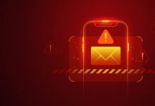 Golpe do Auxílio Reconstrução direciona vítimas a sites de apostas ilegais Uma ilustração de um smartphone em fundo vermelho e com o símbolo de alerta