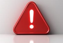 Símbolo vermelho de alerta em fundo branco