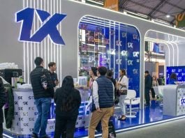 1xBet: um guia para parcerias de afiliados de qualidade na América Latina Estande da 1xBet em uma feira de iGaming no Peru.